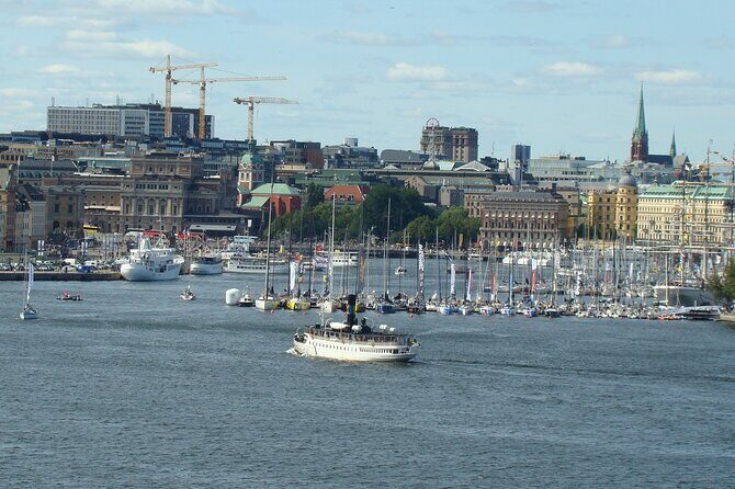 Stockholm- A Beauty On The Water: Old Town Walking Tour and Boat Trip Combined - Riksbron Bridge Views: Knights Island, Government Buildings, and City Hall