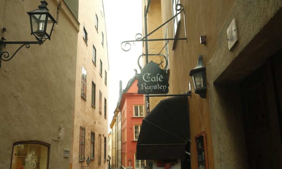 Stockholm: Old Town Self-Guided Tour Learn and solve Puzzles - Stortorget and the Grand Square feel